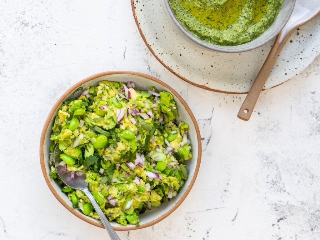 Avocado and edamame smash with red onion and herbs, rich in healthy fats to support hormones and reduce cravings in perimenopause